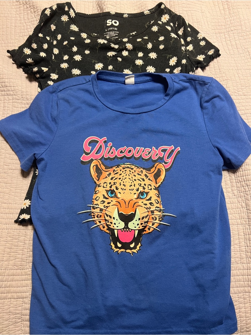 2 shirts Blue 'Discovery' Leopard Graphic Tee & black with daisies tee